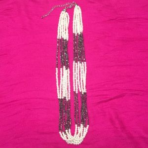 Long pearl and gun metal bead necklace